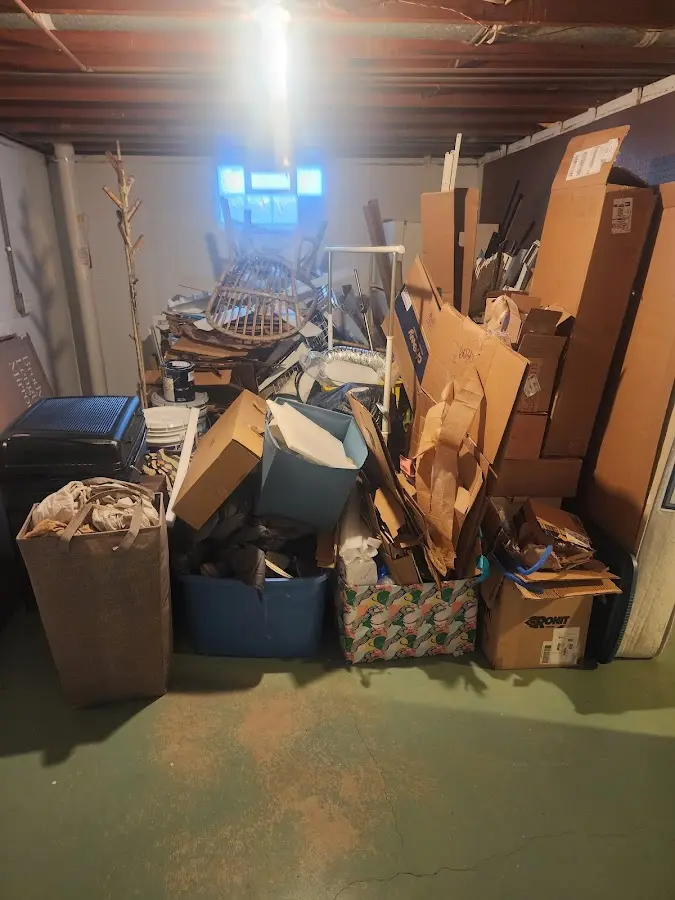 Roll-off dumpster container at job site for 6 Yard Dumpster Rental in Bear Creek